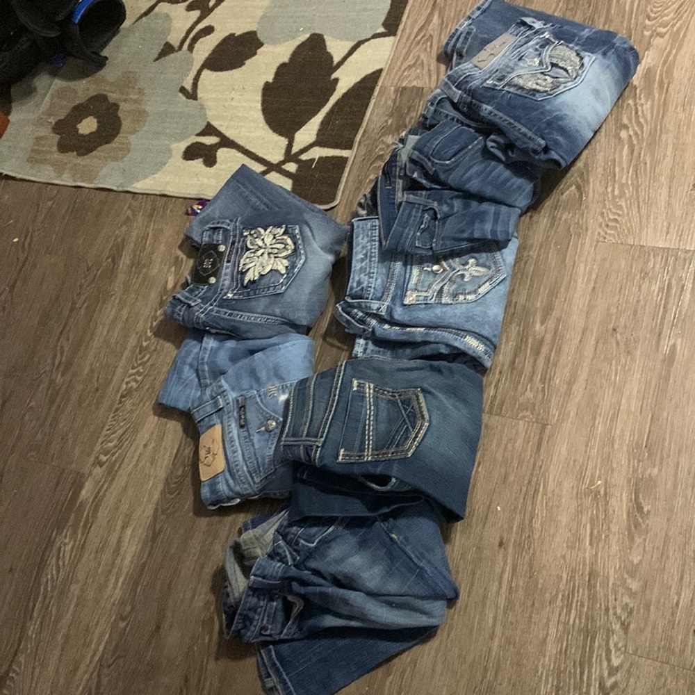 Selling buckle store jeans